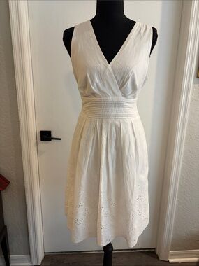 Corey P white sleeveless dress with eyelet trim and tie back V neck size 8